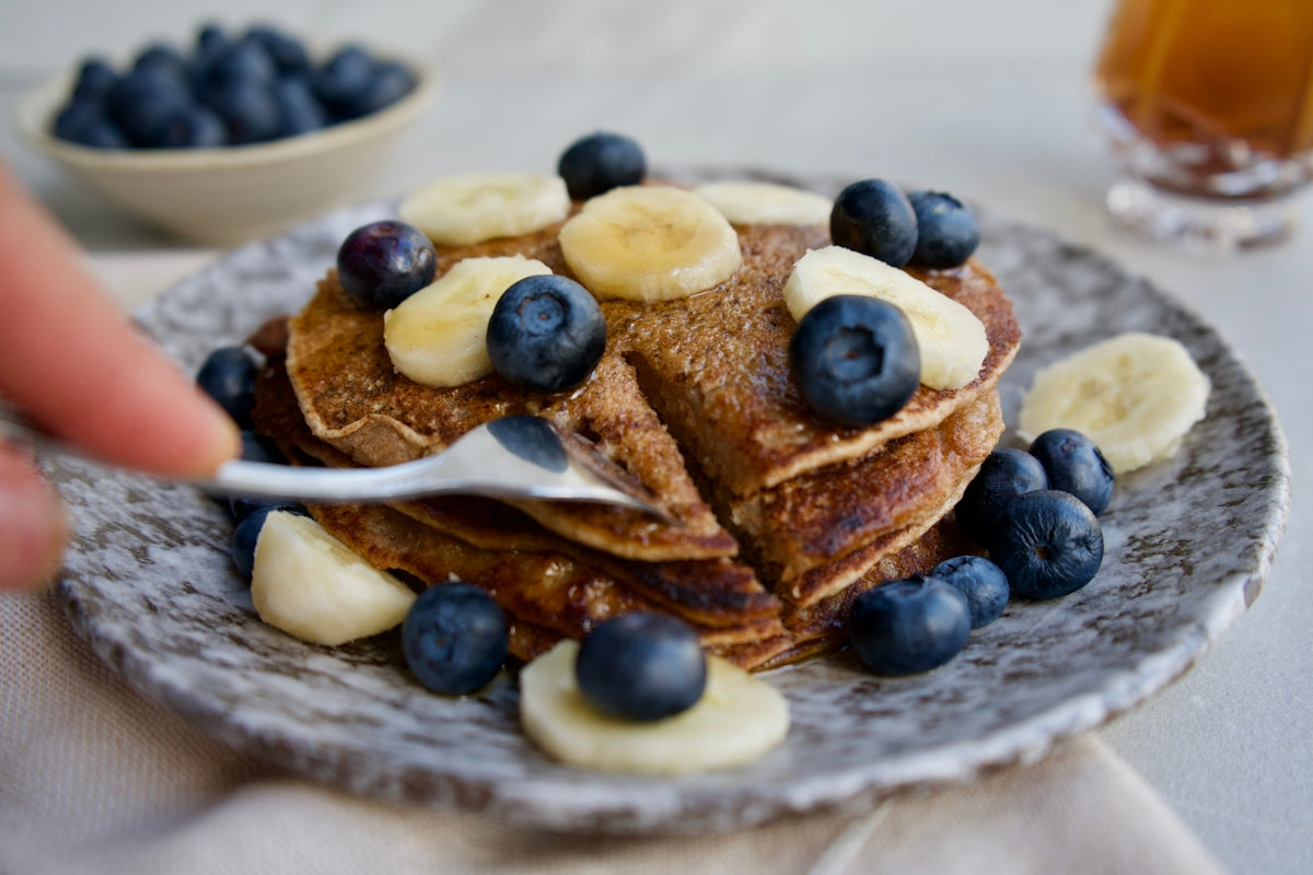 brown bread with blue berries on top